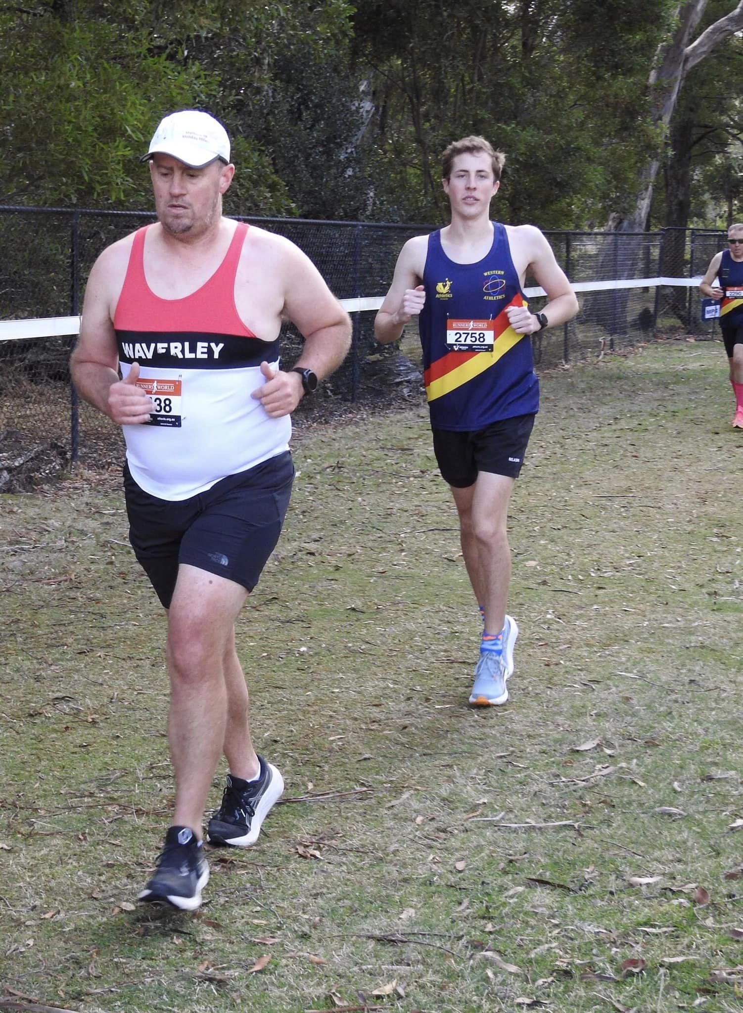 Matt running close behind Waverley runner